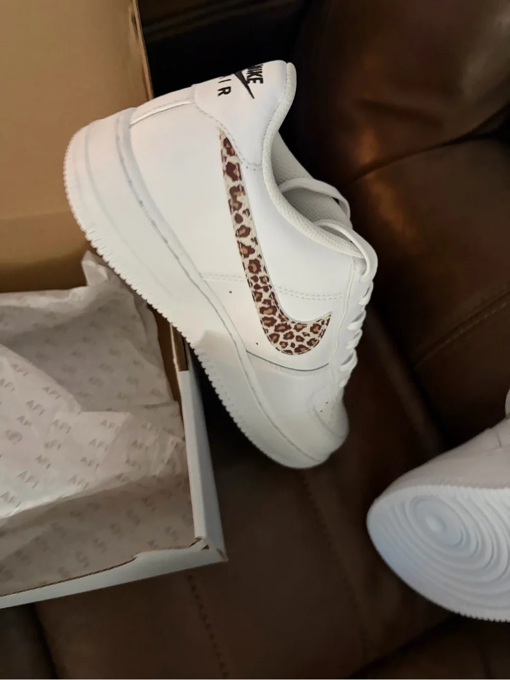 Nike Kids White Sneakers with Leopard Print Swoosh